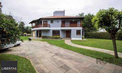 Sobrado com 6 suites, lareira, lavabo, pátio - Bairro Belém Velho