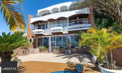 Casa com 4 quartos à venda na Rua Bororó, 25, Vila Assunção, Porto Alegre