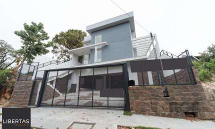 Casa com 3 quartos à venda na Rua Professor Emílio Meyer, 205, Vila Conceição, Porto Alegre