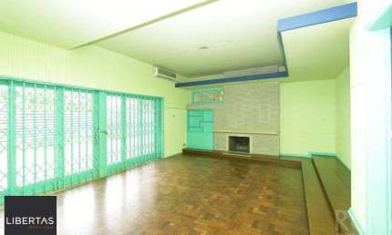 Casa com 5 quartos à venda na Rua Coronel Paulino Teixeira, 394, Rio Branco, Porto Alegre