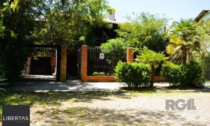 MAGNÍFICA MANSÃO ANOS 90 A BEIRA DO GUAÍBA NA ZONA SUL DE PORTO ALEGRE!