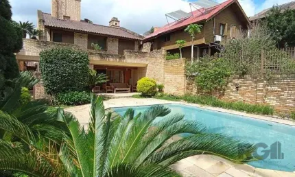 Casa com 3 quartos à venda na Rua Quatorze de Julho, 202, Boa Vista, Porto Alegre