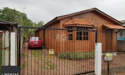 Casa com 2 quartos à venda na Rua Casemiro de Souza, 101, Vila Nova, Porto Alegre