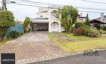 Casa em condomínio fechado com 3 quartos à venda na Avenida Juca Batista, 9000, Belém Novo, Porto Alegre
