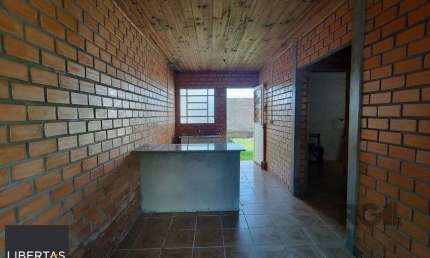 Casa com 2 quartos à venda na Rua Tenente Isolino Segobia, 47, Vila Nova, Porto Alegre