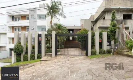 Casa com 4 quartos à venda na Rua Curupaiti, 113, Cristal, Porto Alegre