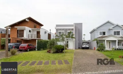 Casa em condomínio fechado com 3 quartos à venda na Avenida Juca Batista, 9000, Belém Novo, Porto Alegre