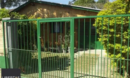 Casa com 3 quartos à venda na Rua Paulo Rubilar de Farias, 65, Restinga, Porto Alegre