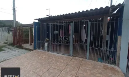 Casa com 3 quartos à venda na Rua Hesiodo Andrade, 73, Hípica, Porto Alegre