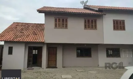 Casa em condomínio fechado com 3 quartos à venda na Rua Vereador Serapião Goulart, 693, Bela Vista, Alvorada