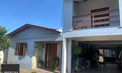 Casa com 4 quartos à venda na Rua Osvaldo Cruz, 159, Maringá, Alvorada
