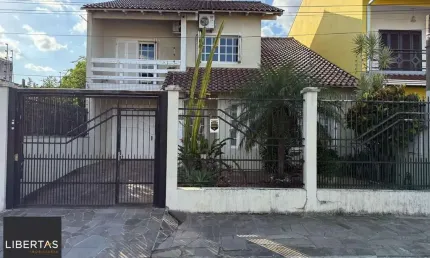 Casa com 4 quartos à venda na Rua Carlos Fraga, 46, Vila Márcia, Cachoeirinha