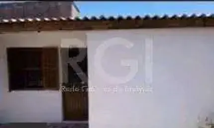 Casa com 3 quartos à venda na Acesso Cinco, 4994, Restinga, Porto Alegre
