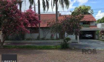Casa com 4 quartos à venda na Avenida Cinco de Novembro, 109, Teresópolis, Porto Alegre