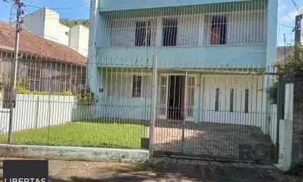 Casa com 4 quartos à venda na Rua Fagundes Varela, 83, Santo Antônio, Porto Alegre
