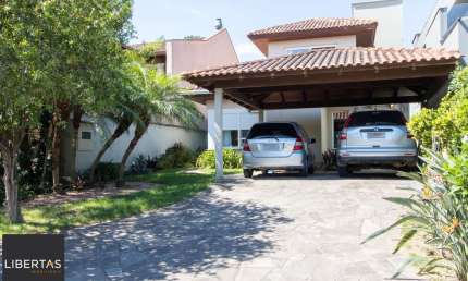Casa em condomínio fechado com 3 quartos à venda na Avenida Juca Batista, 8000, Belém Novo, Porto Alegre