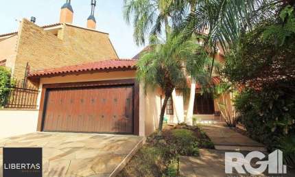 Casa com 4 quartos à venda na Rua Doutor Barbosa Gonçalves, 610, Chácara das Pedras, Porto Alegre