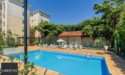 Apartamento com sacada, todo mobiliado de 3 dormitórios com suíte e 2 vagas de garagem.