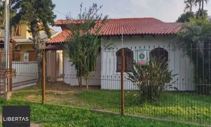 Casa com 4 quartos para alugar na Avenida Guarujá, 199, Guarujá, Porto Alegre