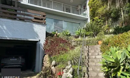 Casa com 3 quartos à venda na Rua Edgar Luiz Schneider, 480, Jardim Isabel, Porto Alegre