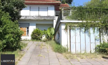 Casa com 4 quartos à venda na Avenida Guaíba, 4274, Vila Assunção, Porto Alegre