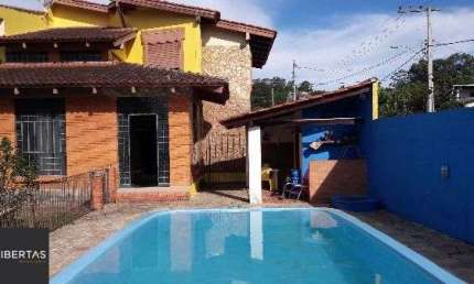 Casa em Porto Alegre, no bairro Aberta dos Morros, com 4 dormitório(s), e 4 banheiros, à venda.