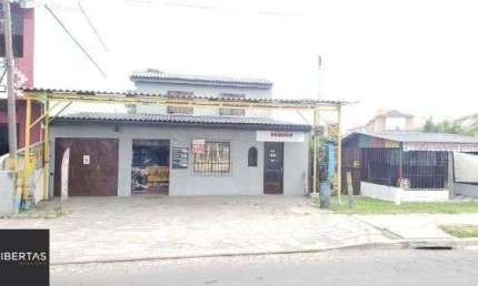Casa com 4 quartos à venda na Avenida João Antônio Silveira, 120, Restinga, Porto Alegre