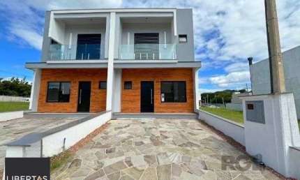 Casa Condominio em Porto Alegre, no bairro Campo Novo, com 3 dormitório(s), e 3 banheiros, à venda.