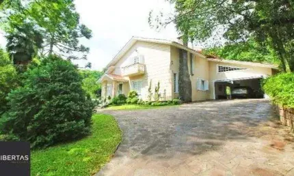 Casa Condominio em Porto Alegre, no bairro Cascata, com 3 dormitório(s), e 3 banheiros, à venda.