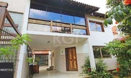 Casa em Porto Alegre, no bairro Hípica, com 3 dormitório(s), e 3 banheiros, à venda.