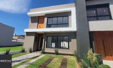 Casa Condominio em Porto Alegre, no bairro Ipanema, com 3 dormitório(s), e 3 banheiros, à venda.