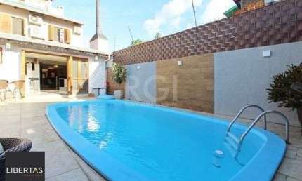 Casa em Porto Alegre, no bairro Ipanema, com 4 dormitório(s), e 4 banheiros, à venda.