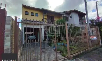 Casa em Porto Alegre, no bairro Hípica, com 3 dormitório(s), e 3 banheiros, à venda.