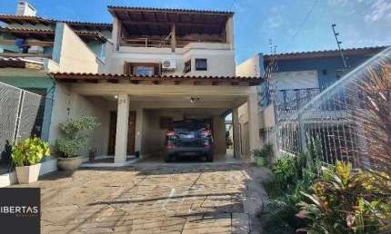 Casa em Porto Alegre, no bairro Espírito Santo, com 3 dormitório(s), e 3 banheiros, à venda.