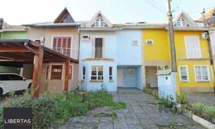 Casa Condominio em Porto Alegre, no bairro Guarujá, com 3 dormitório(s), e 3 banheiros, à venda.