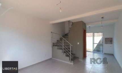 Casa Condominio em Porto Alegre, no bairro Vila Nova, com 2 dormitório(s), e 2 banheiros, à venda.