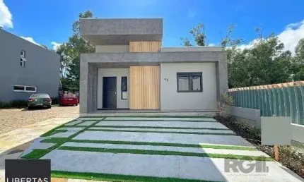 Casa em Porto Alegre, no bairro Hípica, com 3 dormitório(s), e 3 banheiros, à venda.