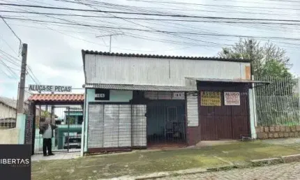 Casa em Porto Alegre, no bairro Santo Antônio, com 3 dormitório(s), e 3 banheiros, à venda.