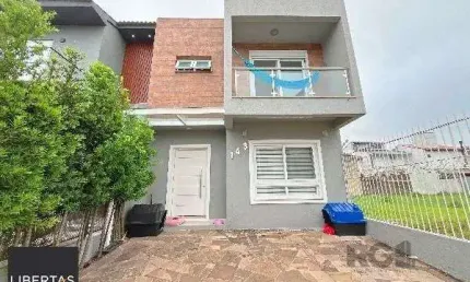 Casa em Porto Alegre, no bairro Hípica, com 3 dormitório(s), e 3 banheiros, à venda.