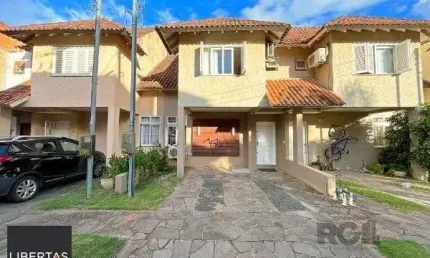 Casa em Porto Alegre, no bairro Campo Novo, com 3 dormitório(s), e 3 banheiros, à venda.