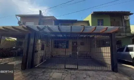 Casa em Porto Alegre, no bairro Hípica, com 3 dormitório(s), à venda.