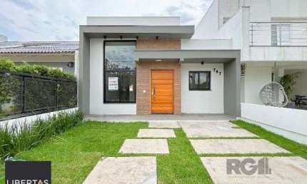 Casa em Porto Alegre, no bairro Hípica, com 3 dormitório(s), e 3 banheiros, à venda.
