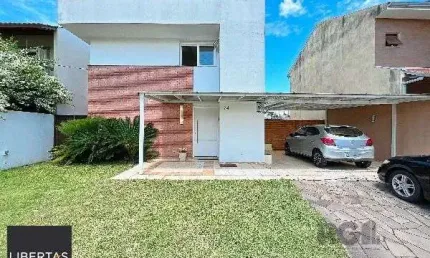 Casa em Porto Alegre, no bairro Hípica, com 3 dormitório(s), e 3 banheiros, à venda.