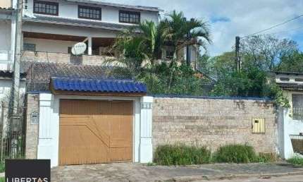 Casa em Porto Alegre, no bairro Restinga, com 4 dormitório(s), e 4 banheiros, à venda.