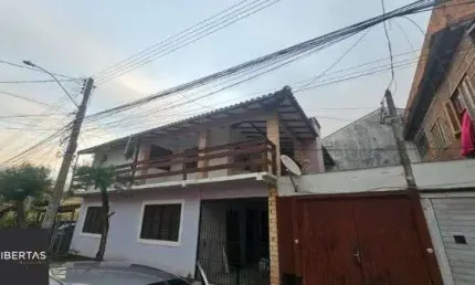 Casa à venda na Rua Hesiodo Andrade, 272, Hípica, Porto Alegre