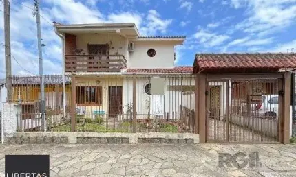 Casa em Porto Alegre, no bairro Aberta dos Morros, com 3 dormitório(s), à venda.
