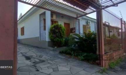 Casa com 3 quartos à venda na Rua dos Apóstolos, 423, Nonoai, Porto Alegre