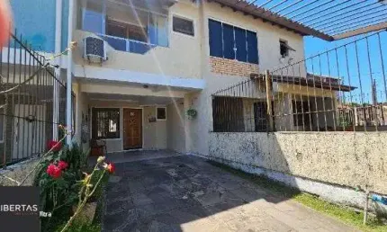 Casa com 2 quartos à venda na Rua Santos Zottis, 160, Hípica, Porto Alegre