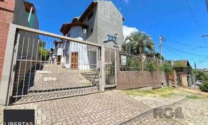 Casa em condomínio fechado com 3 quartos à venda na Rua Costa Lima, 737, Nonoai, Porto Alegre