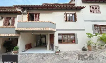 Casa em condomínio fechado com 3 quartos à venda na Rua dos Caiaguais, 235, Espírito Santo, Porto Alegre